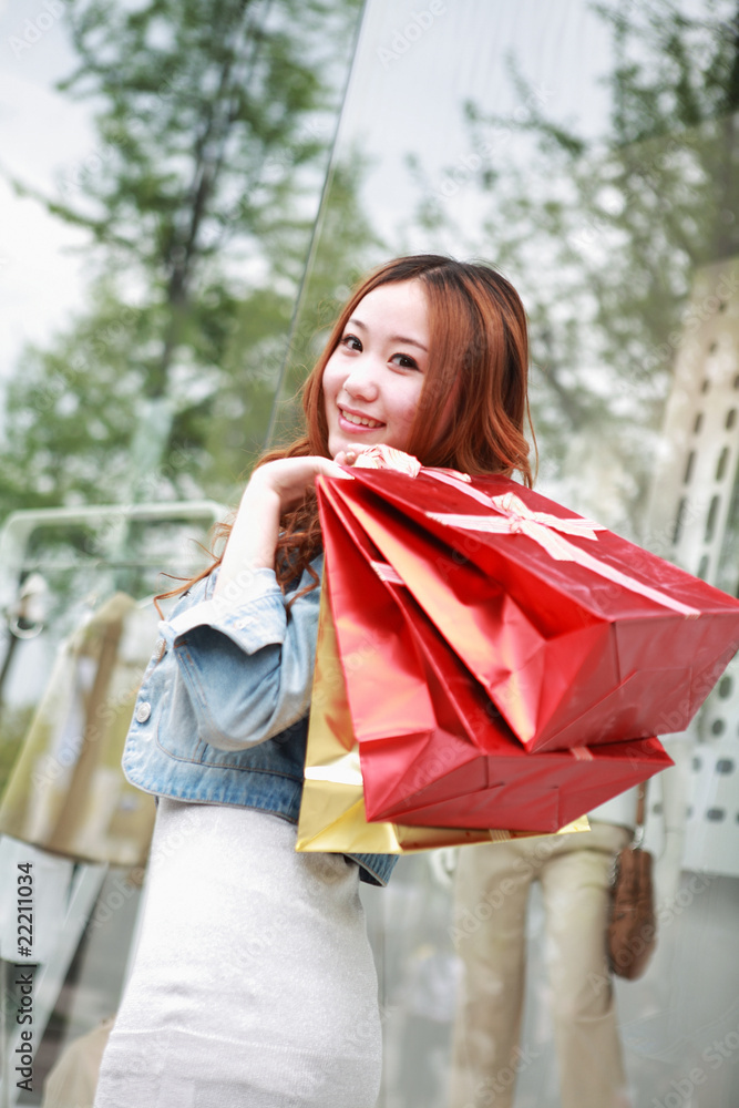 asian girl with shopping bags