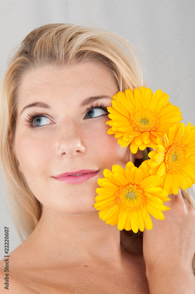 beautiful woman with pure healthy skin with flowers beautiful woman with pure healthy skin with flowers