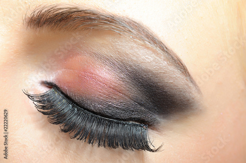 elegant woman eye with dark make-up