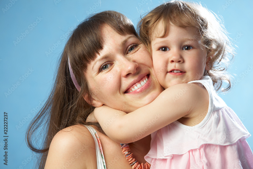 Portrait of young mother with her daughter Portrait of young mother with her daughter