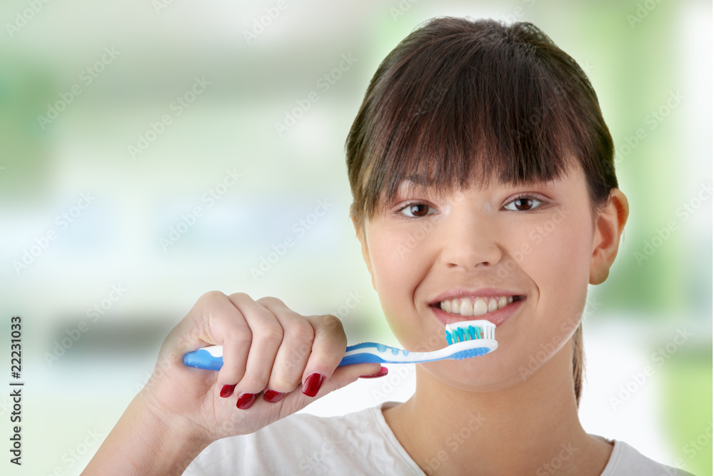 Washing her teeth Washing her teeth