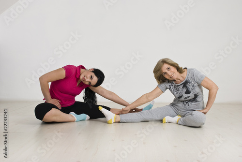 Active two women doing gymnastic