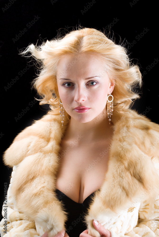 Sexy model wearing winter fur coat Sexy model wearing winter fur coat