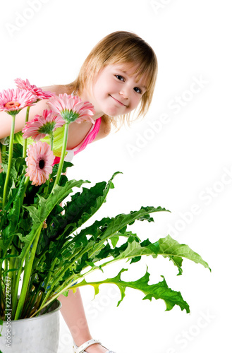 Cute little girl with the pink wlowers photo