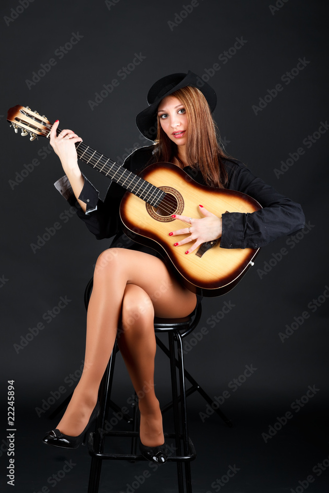 Woman with guitar.
