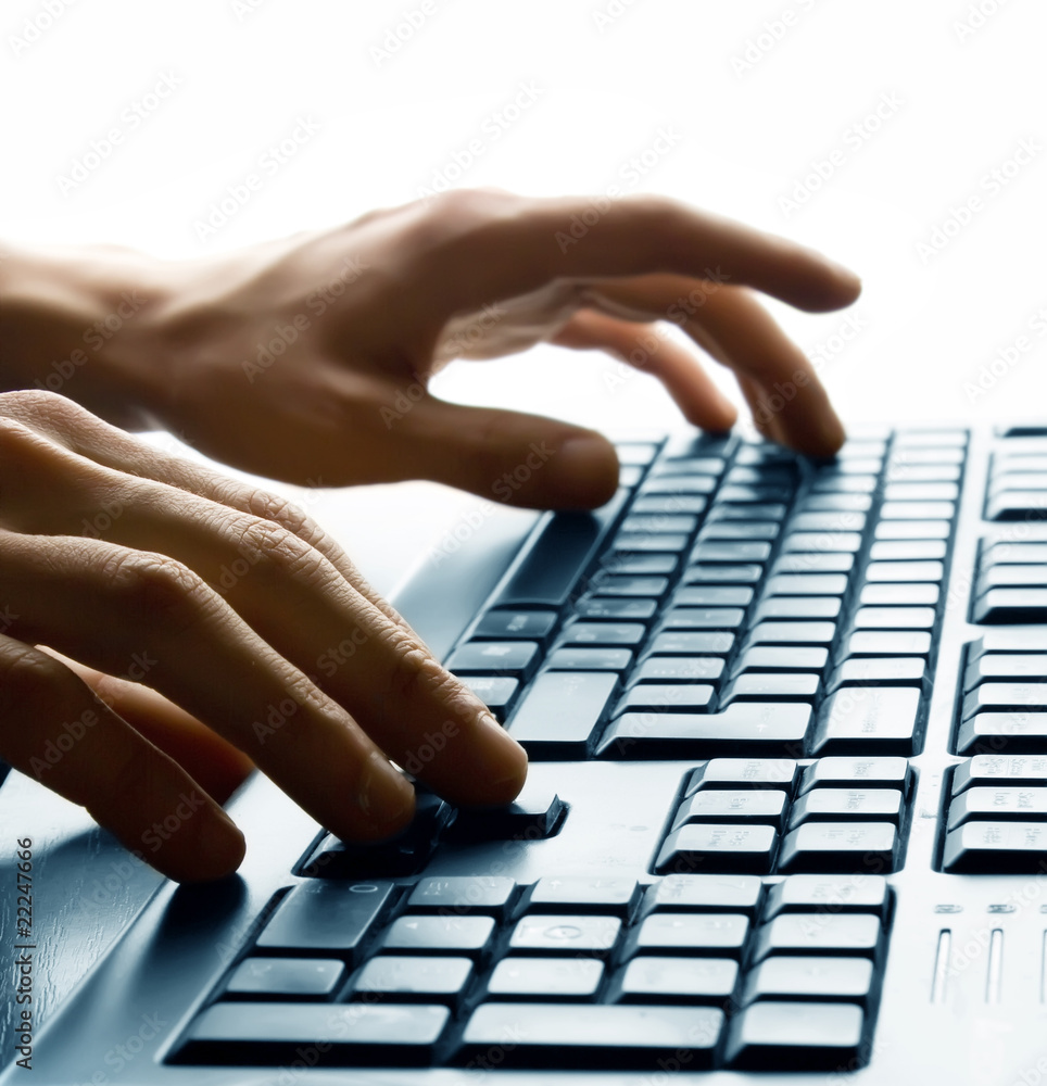 Hand typing on keyboard Hand typing on keyboard