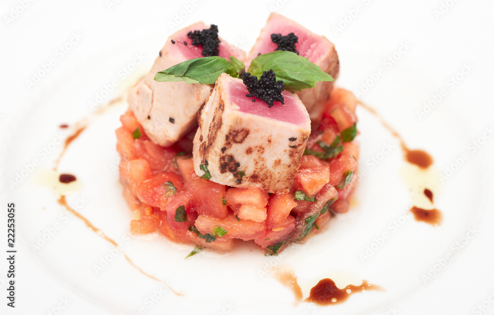 Rare fried tuna on tomato tartare Rare fried tuna on tomato tartare