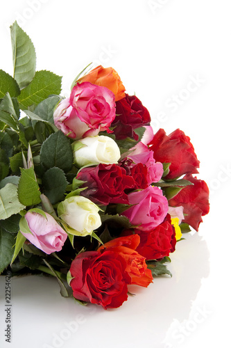 Bouquet of colorful roses over white background