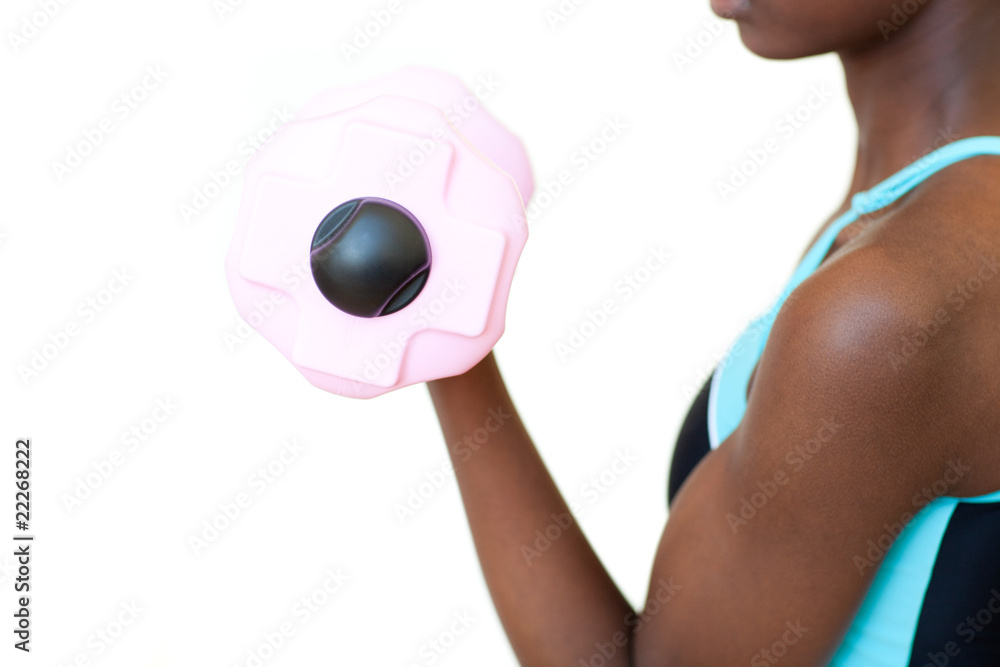 Fototapeta premium Afro-american woman working out with dumbbell