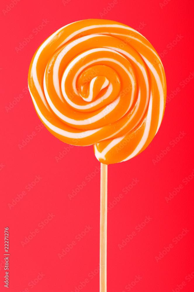 Colourful lollipop against the colourful background Colourful lollipop against the colourful background