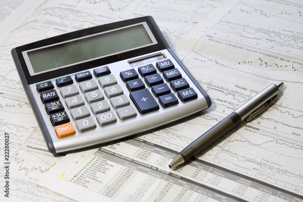 Pen, Calculator And Newspaper Pen, Calculator And Newspaper
