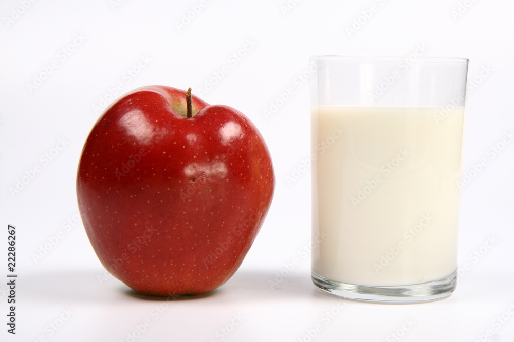 Apple and a glass of milk on white background Apple and a glass of milk on white background