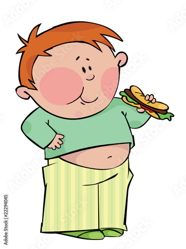Young boy eating hotdog