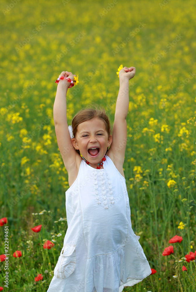 Pretty young girl screaming with delight in rapeseed field Pretty young girl screaming with delight in rapeseed field