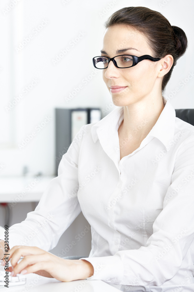 Beautiful young businesswoman working at office Beautiful young businesswoman working at office