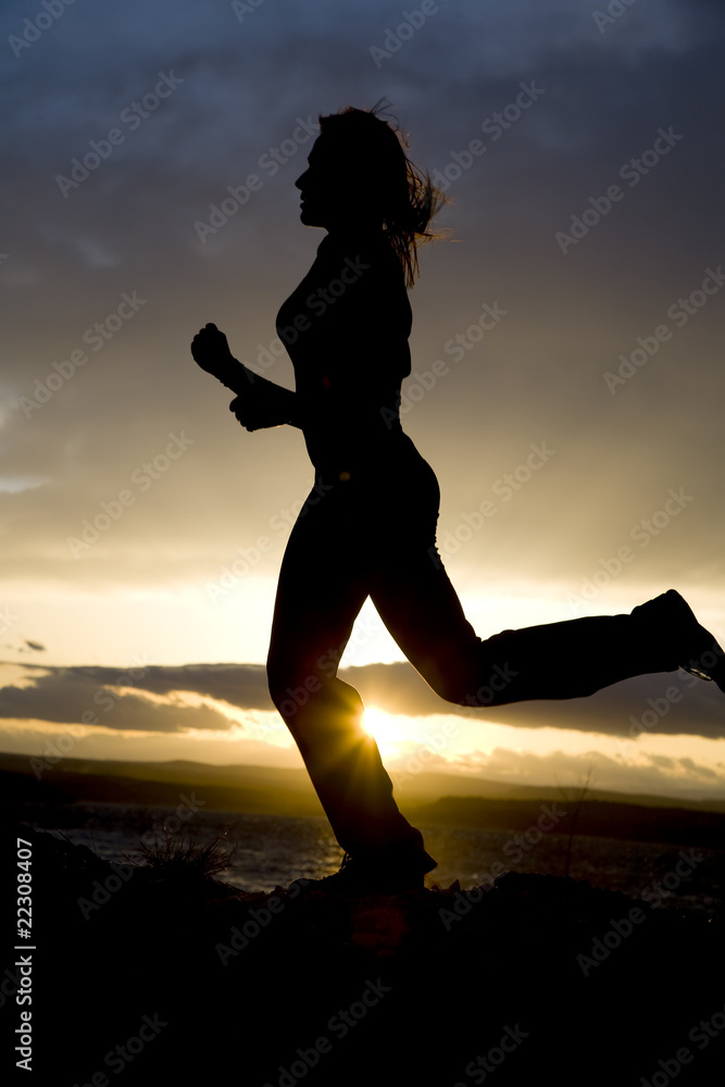 woman running silhouette woman running silhouette