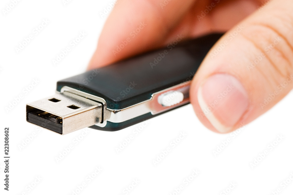 Flash drive in hand isolated on white background Flash drive in hand isolated on white background