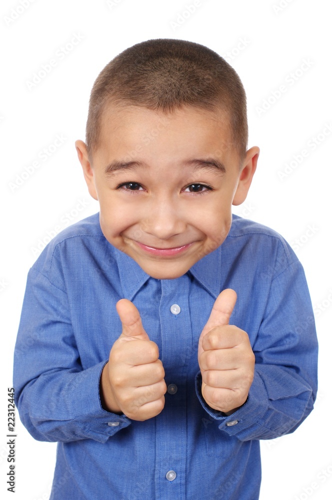 Smiling boy giving thumbs up sign, isolated on white Stock Photo ...