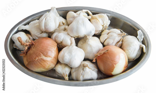 Garlic and Onions on silver tray.