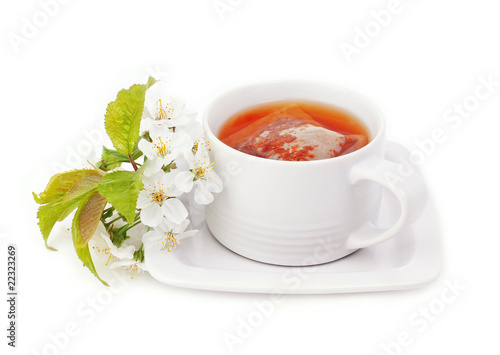 cup of tea and flowers. isolated on a white background.