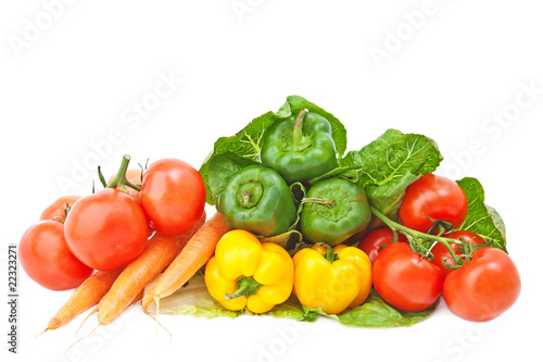 Various fresh vegetables on white background.