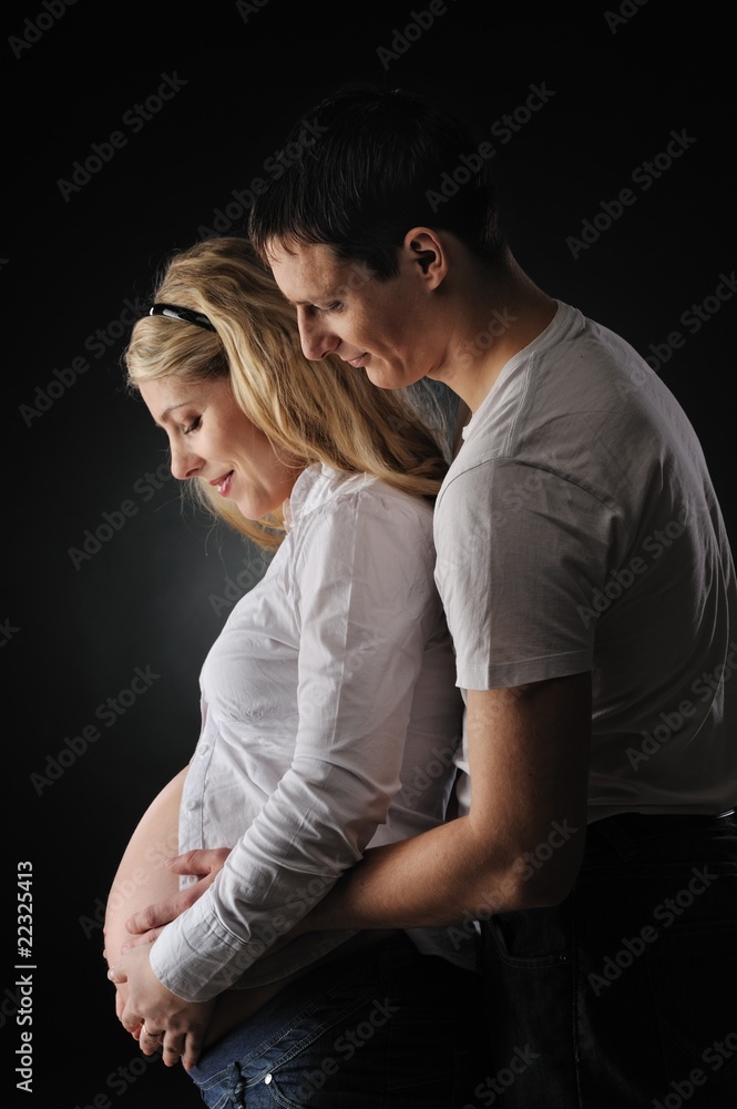 Beautiful couple expecting a baby . Beautiful couple expecting a baby .