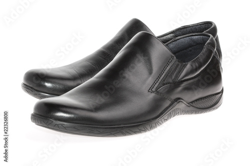 New leather men shoes isolated on white background © natavin