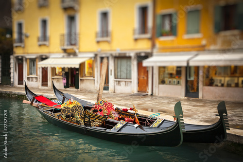 Traditional gondoles in Venice photo