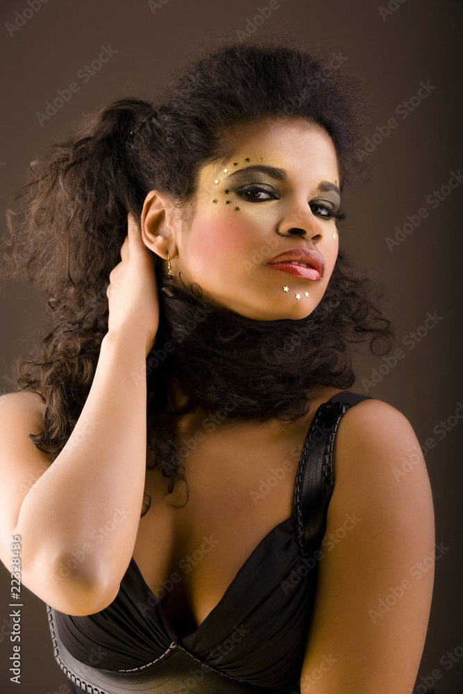 Fototapeta premium Young beautiful African woman with art make-up