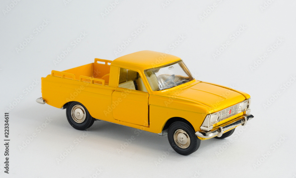 yellow car toy isolated on white yellow car toy isolated on white
