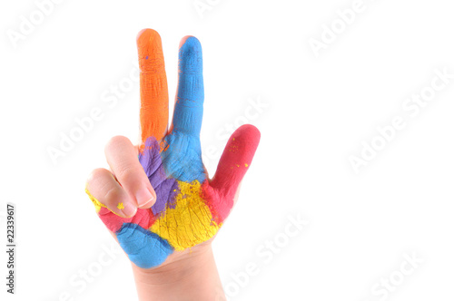 Colorful hand of a kid with three fingers up