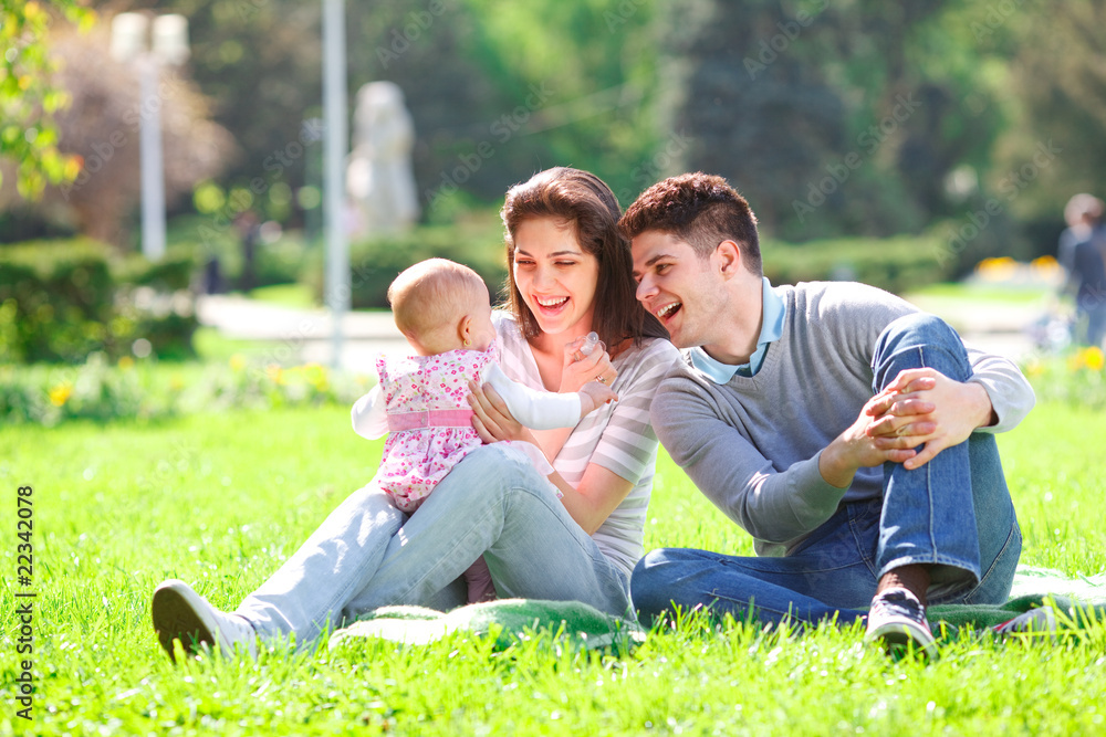 Young Family in the Park Young Family in the Park