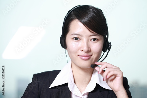 business woman working with headphone photo