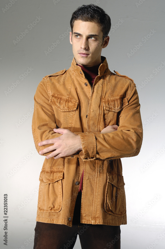 young man with hands folded isolated on white background young man with hands folded isolated on white background