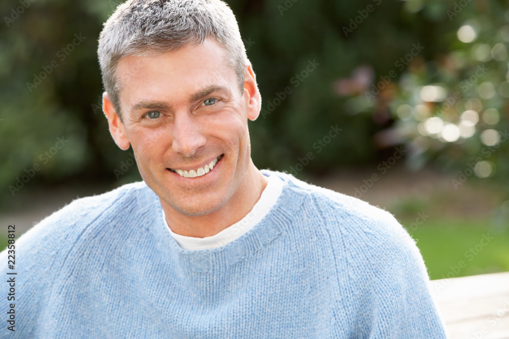 Close Up Portrait Of Man Standing Outside In Autumn Landscape Close Up Portrait Of Man Standing Outside In Autumn Landscape