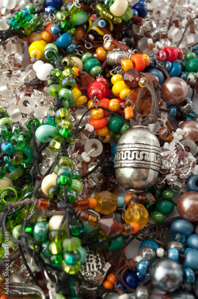 Heap of glass bead accessories. Homemade jewelry