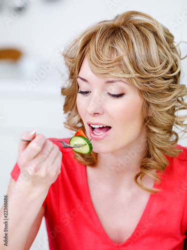 Blonde eating woman