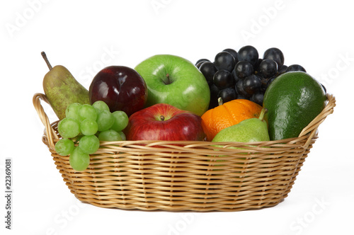 Ripe fresh fruit in basket on white background