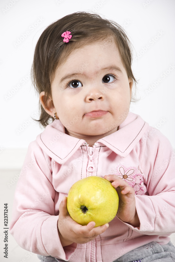 Silky baby holding an apple Silky baby holding an apple