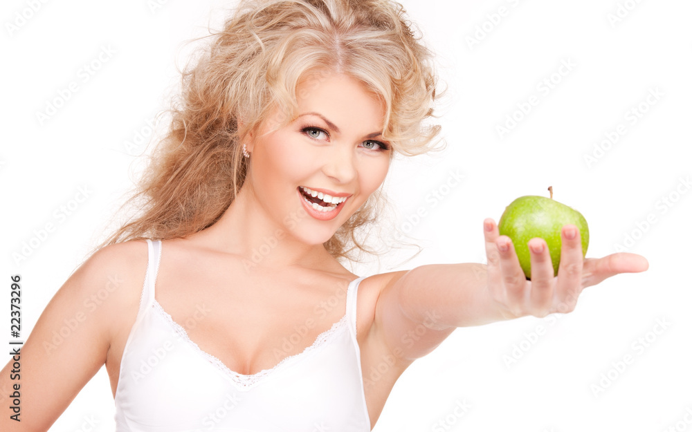 young beautiful woman with green apple young beautiful woman with green apple