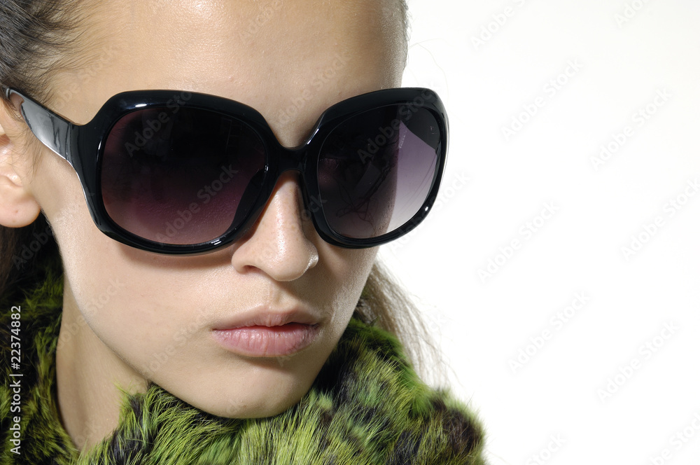 Fashion model wearing the big modern sunglasses Fashion model wearing the big modern sunglasses
