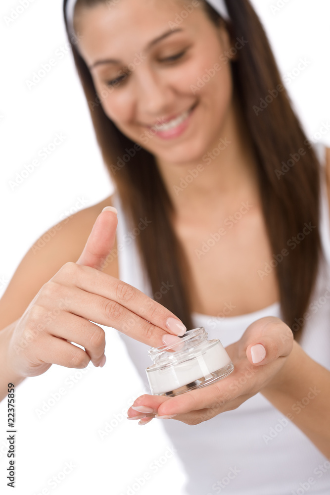 Beauty facial care - Young woman apply moisturizer Beauty facial care - Young woman apply moisturizer