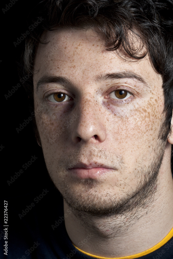 Obraz premium Sceptical Boy with Freckles