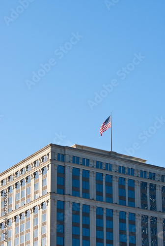 Top Floors of an Office Building with American Flag