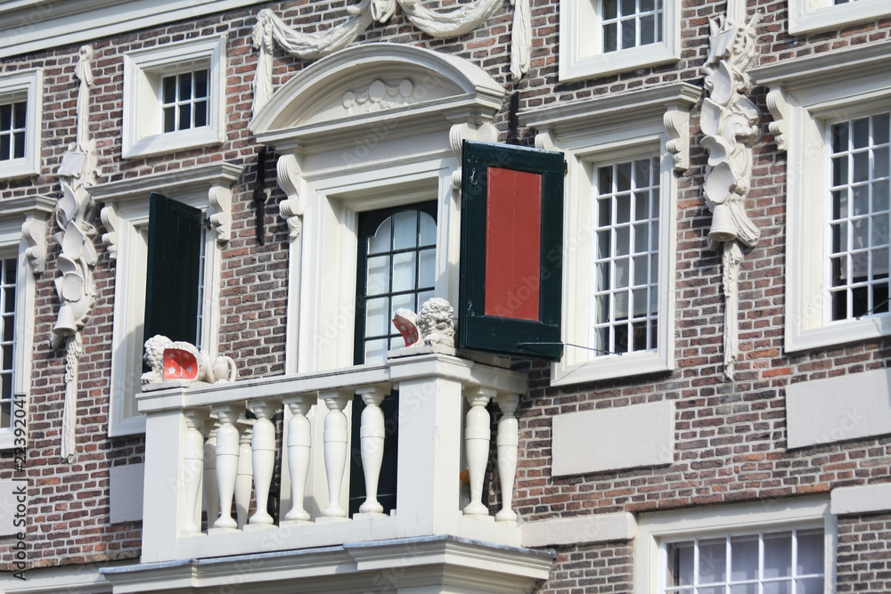 Obraz premium balcony on a histocic dutch facade