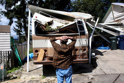 man and damaged rv