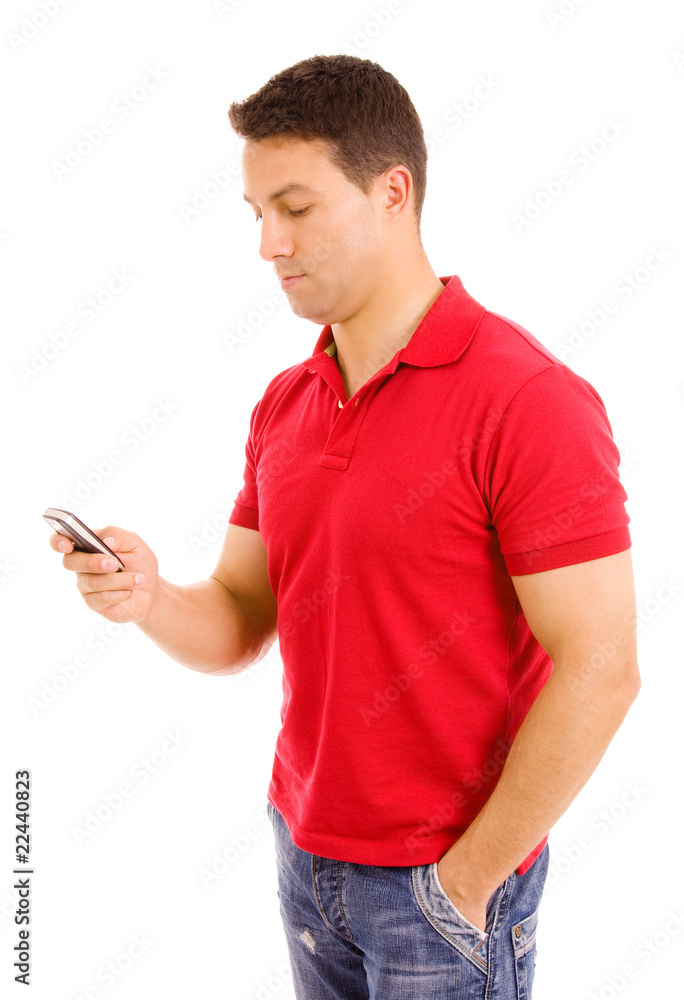 Young casual man using cellphone, isolated on white Young casual man using cellphone, isolated on white