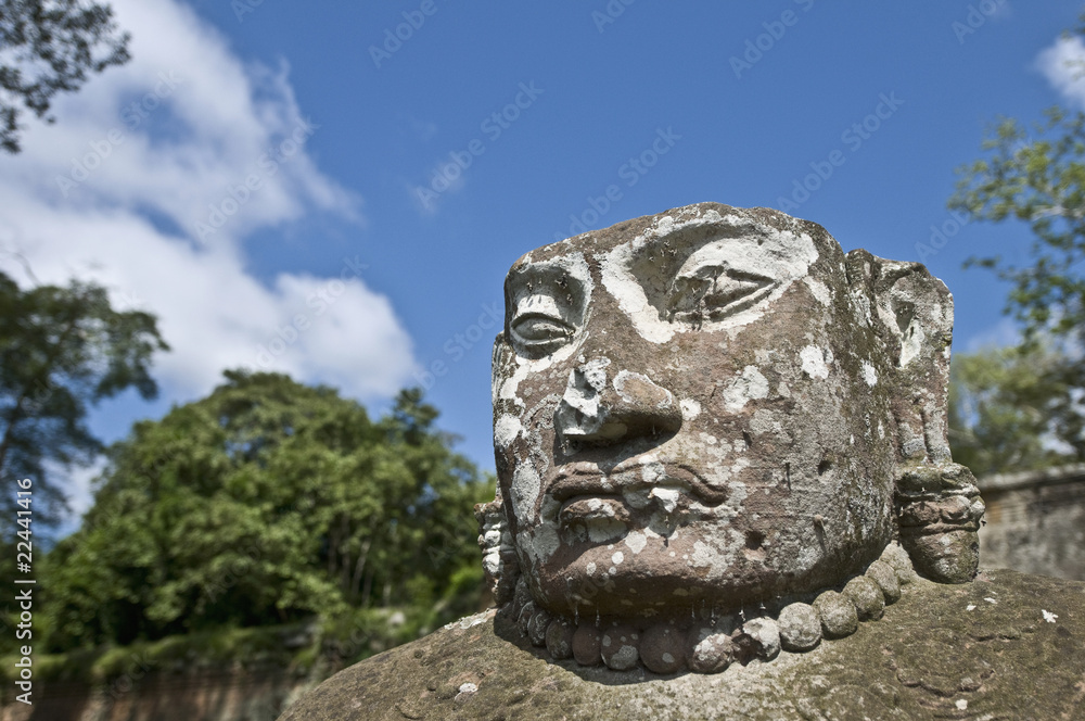 Heads of the guardians of Angkor Thom within the Angkor Temples