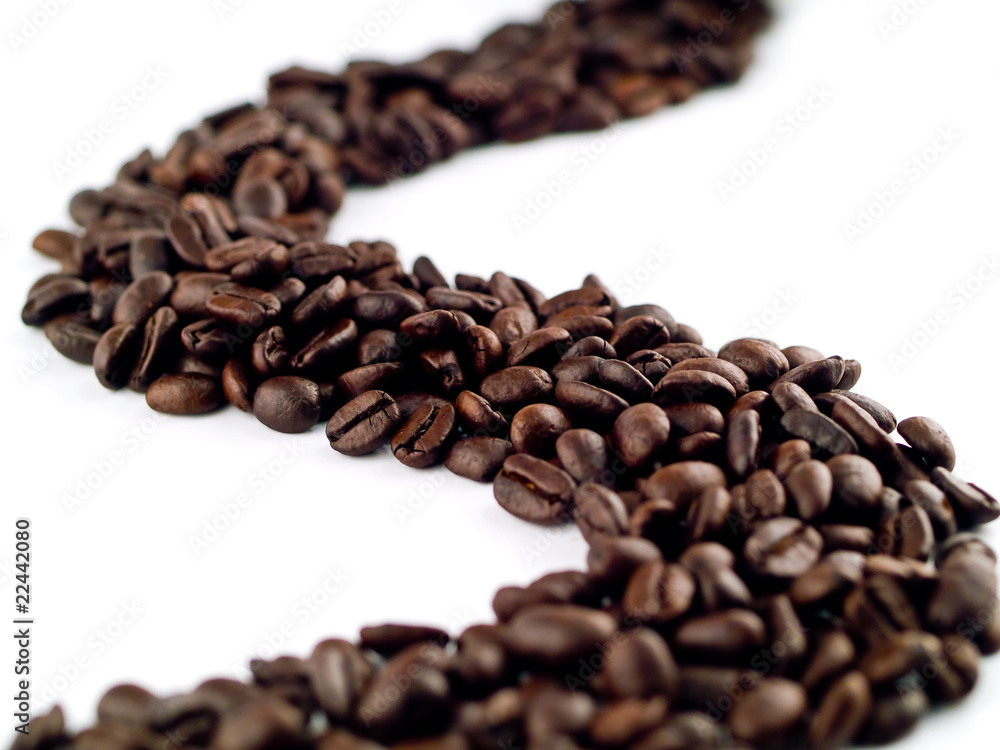 Obraz premium Whole Coffee Beans on a White Background