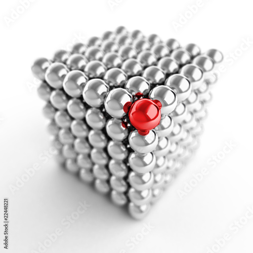 Different element. Cube made from shiny metal balls
